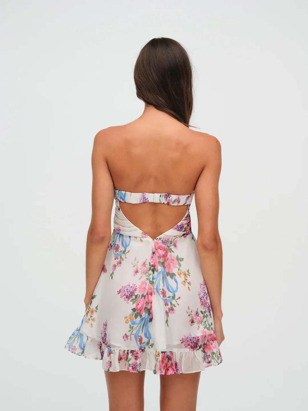 Aurea – Minikleid mit Blumenmuster und trägerloser, fließender Silhouette