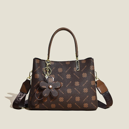 Ysabel – Vintage Ledertasche mit Blumenmuster und Accessoires