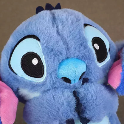 DreamBuddy – Weiches Stitch Plüschtier mit beruhigenden Lichtern und Musik